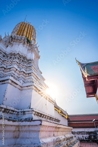 Obraz na płótnie Climb the prang to pay homage to the Buddha's relics at a large Phra Si Rattana Mahathat is a Buddhist temple (wat) event tourist attractions It is a major tourist attraction Phitsanulok,Thailand. w salonie