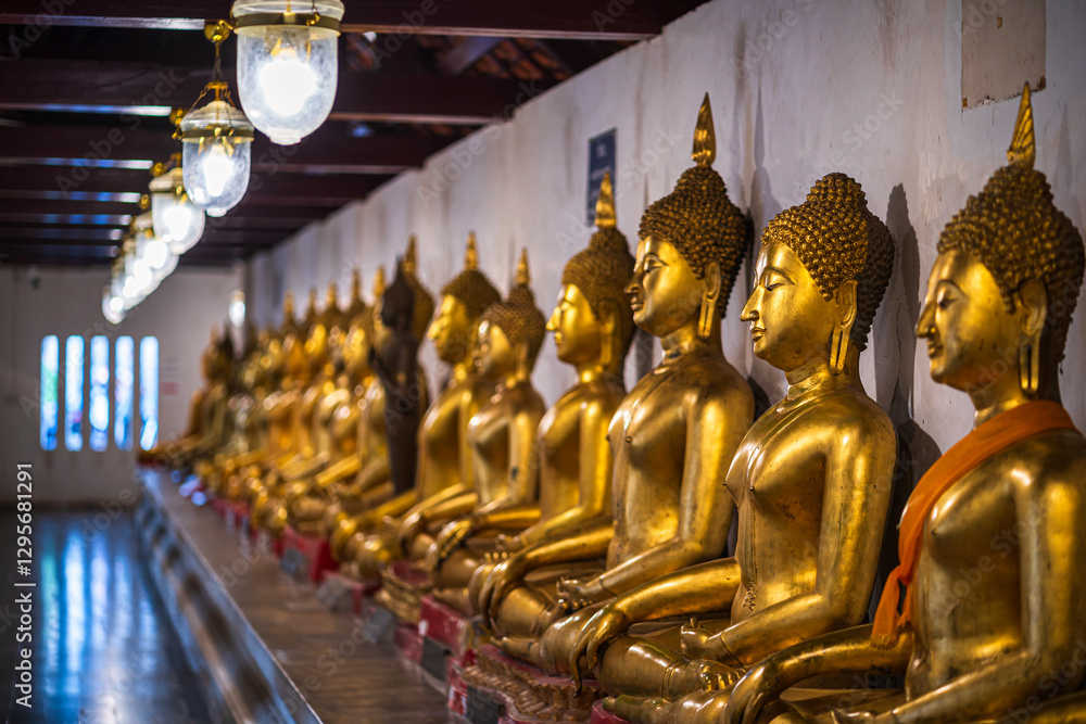 Old Beautiful Golden Buddha Many statues at Wat Phra Si Rattana Mahathat also colloquially referred to as Wat Yai is a Buddhist temple It is a major tourist is Public places in Phitsanulok,Thailand.