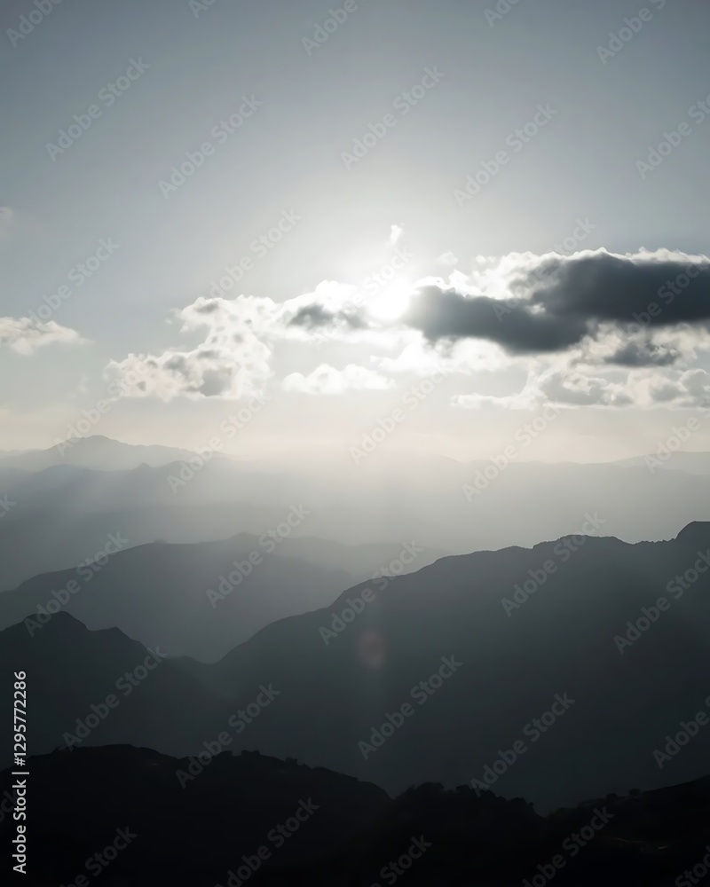 Fototapeta premium Sunlit Mountain Ranges at Dawn