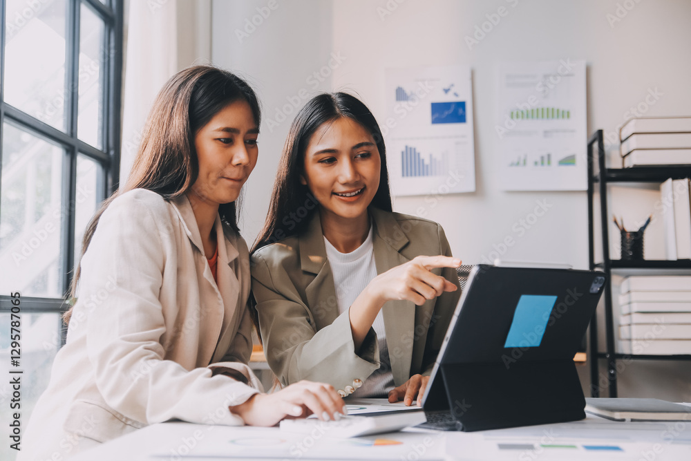Group of Asian business people team meeting in modern office working design planning and ideas concept Group of Asian business people team meeting in modern office working design planning and ideas concept
