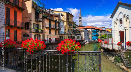 Italy, Piedmont. Orta lake. (Lago di Orta). Scenic colorful town Omegna with charming canals and floral street