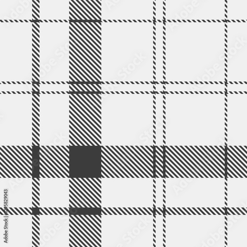 Stylish black and white plaid pattern.  Perfect for textile design, website backgrounds, or fashion projects.