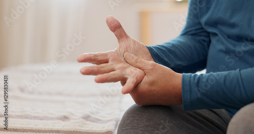 фотографія Senior man, hands and arthritis with joint pain, inflammation or Parkinson disease on bed at home