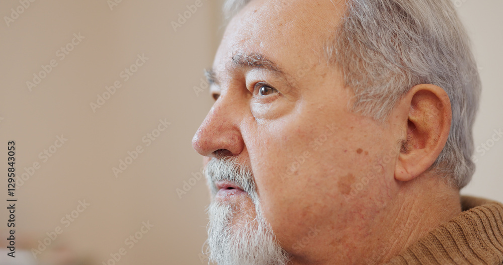 Fototapeta premium Home, senior man and sad with thinking in retirement for depression, mental health and nostalgia. Elderly person, lonely and remember with idea in living room for worry, aging and unhappy in house