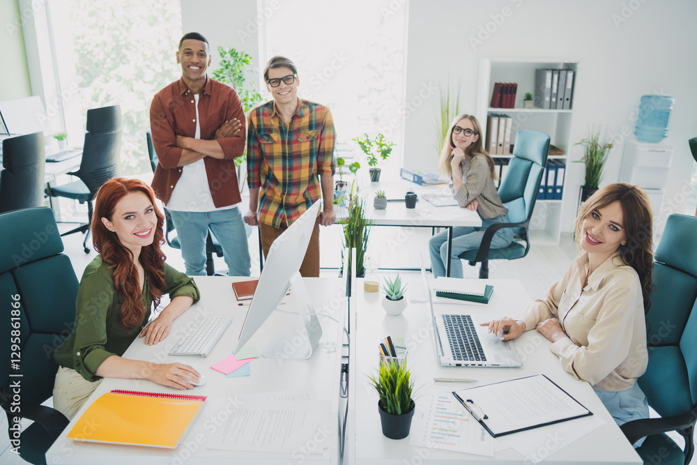 Obraz premium Photo of group five young corporate workers crossed arms computer desk workstation office business center indoors
