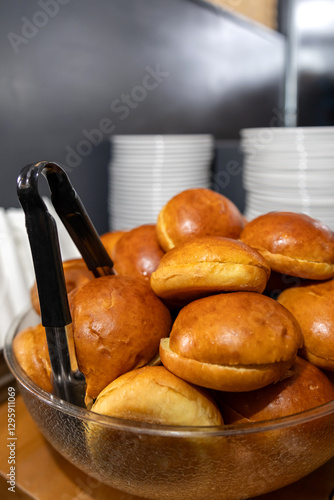 Wallpaper Mural Delicious crusty buns for burgers. Many empty burger buns close-up. Fresh burger buns cut in half on a plate on the table ready for cooking. Ingredients for burgers in fast food Torontodigital.ca