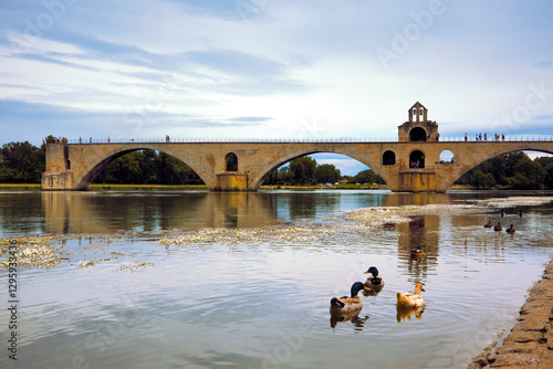 Famous Pont St-Bénezet, medieval bridge ruin crossing the Rhône river halfway, also known as Pont d'Avignon, Provence region, France photo