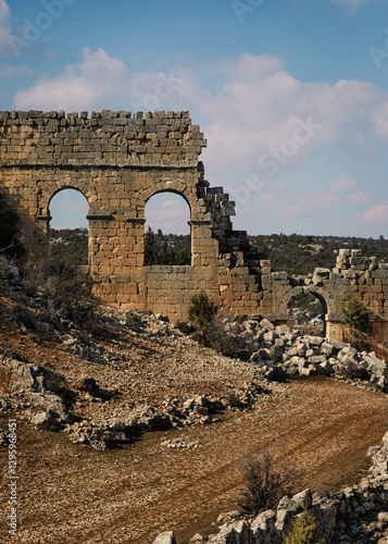 Ruins of an Ancient Roman Aqueduct in Uzuncaburc, Olba, Turkey photo