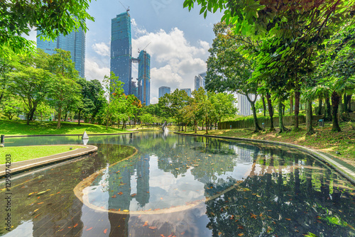 Photography Scenic artificial lake in a green city park, Kuala Lumpur