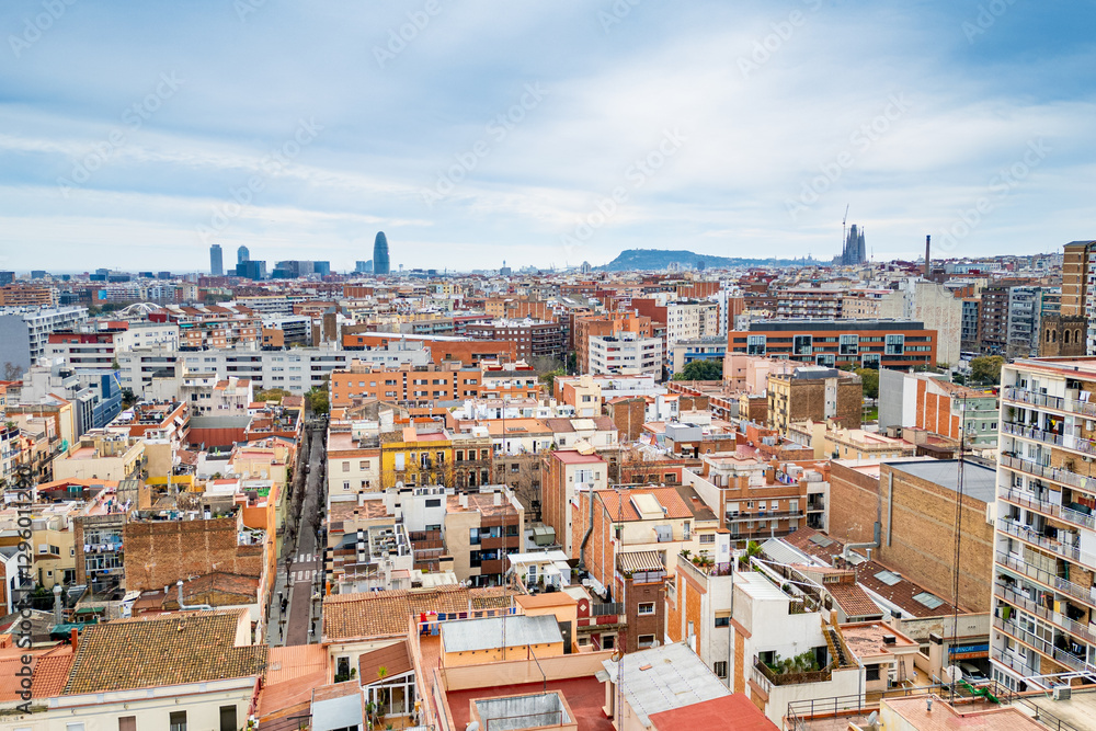 Fototapeta premium Aerial view of the Sant Andreu neighborhood in Barcelona with residential buildings and streets. Concept of housing crisis in Spain