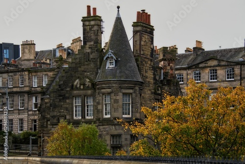 Historic stone building with conical roof in Edinburgh.