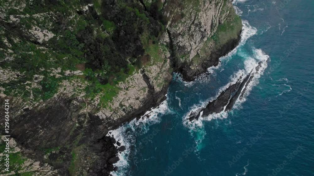 Top down aerial of the Atlantic ocean coast and the mountains of Madeira Top down aerial of the Atlantic ocean coast and the mountains of Madeira
