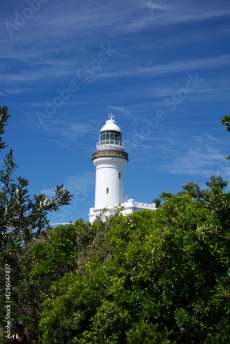 Wallpaper Mural Byron Bay lighthouse with blue sky and green trees  Torontodigital.ca