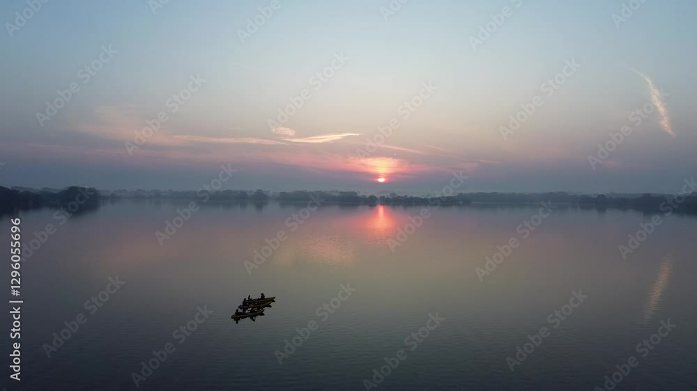 Aerial Raw drone video of team of sport kayak in iconic lake of Kala wewa , Anuradhapura , Sri Lanaka Aerial Raw drone video of team of sport kayak in iconic lake of Kala wewa , Anuradhapura , Sri Lanaka