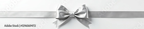 Intricately designed silver bow on a pure white base, ornament, holiday