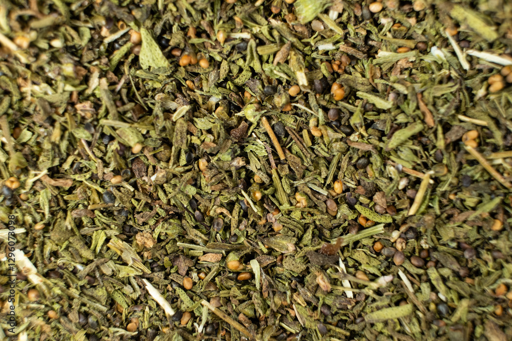 Culinary savory herb texture background top view. Culinary savory herb texture background top view.