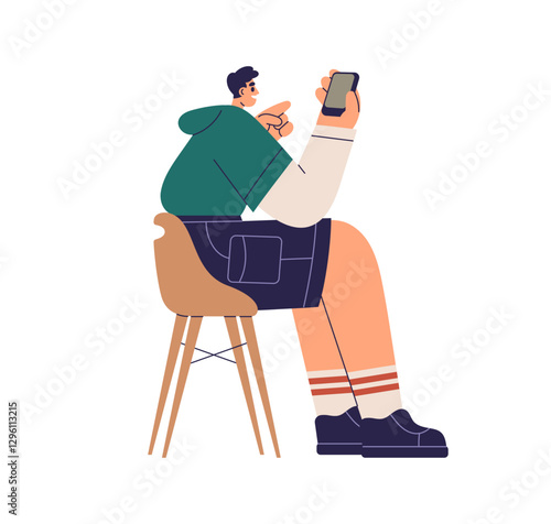 Man sitting on chair, holding smartphone. Mobile phone user. Male with cellph...