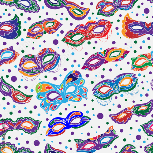 Seamless pattern with bright carnival masks in a decorative style. Inspired by Brazilian carnival, Venetian masks, and festive vibes