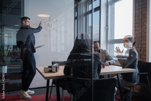 Business team discussing AI technology in a modern office. Concept of artificial intelligence in corporate strategy, innovation, and digital transformation