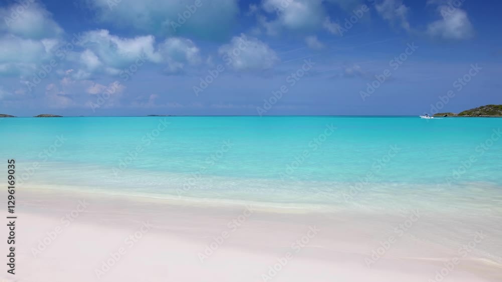 The turquoise shining ocean at the famous Tropic of Cancer Beach, Little Exuma island, the Bahamas, as a background or texture The turquoise shining ocean at the famous Tropic of Cancer Beach, Little Exuma island, the Bahamas, as a background or texture