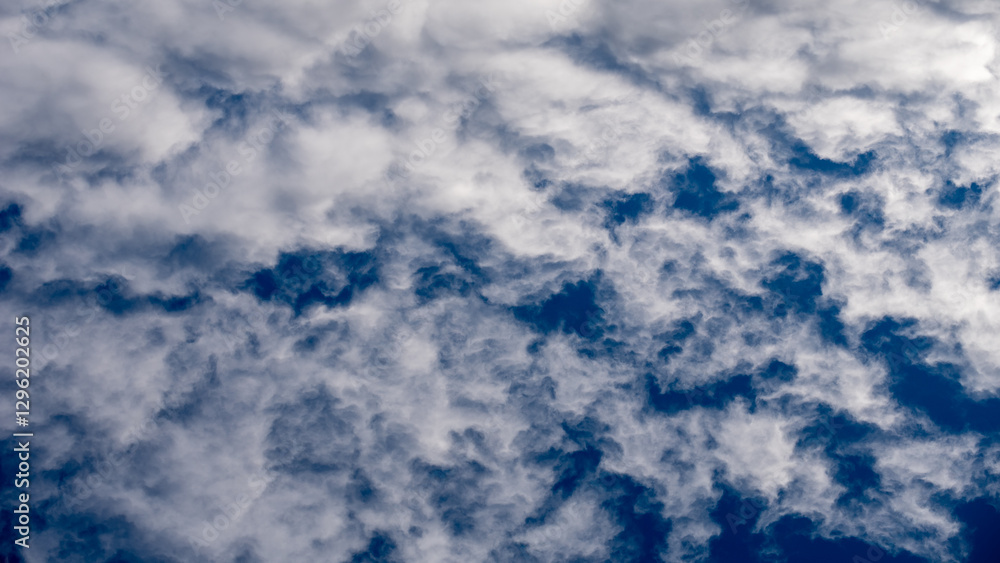 Obraz premium pattern blue day sky with white clouds