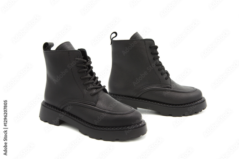 Fashionable leather lace-up boots with heels isolated on white background. View from all sides. Fashionable leather lace-up boots with heels isolated on white background. View from all sides.