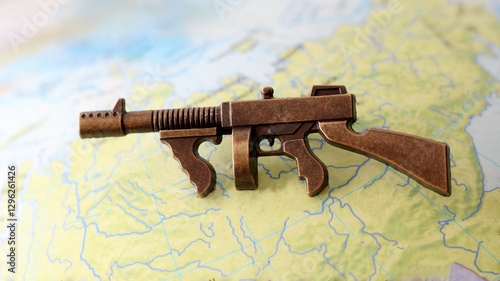 Fotografie gun, weapon, shoot, war, map, world, globe, country, metal, theme, toy, attack,