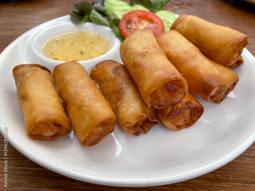 Vegetable spring rolls served with sweet plum sauce Vegetable spring rolls served with sweet plum sauce