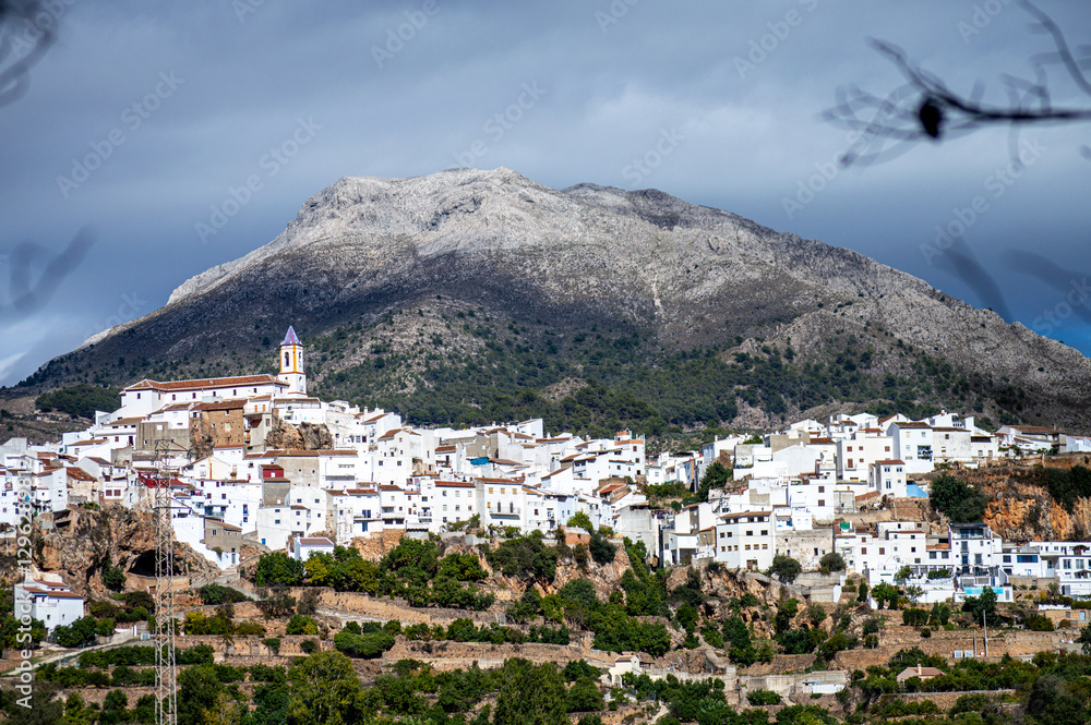 Fototapeta premium Panoramic view on picturesque typical Spanish village with cozy white houses in Yunquera, Andalusia, Spain