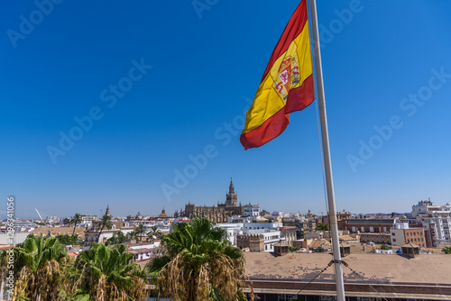 Obraz na płótnie Seville, Spain - August 01, 2024: Sevilla Cathedral (Catedral de Santa Maria de la Sede), Gothic style architecture in Spain, Andalusia. Historic buildings and monuments of Seville, Spain. w salonie