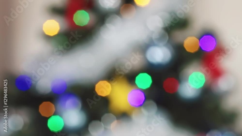 Wallpaper Mural view of glowing Christmas tree lights in vibrant colors, focusing on their twinkling effect, evoking holiday Torontodigital.ca