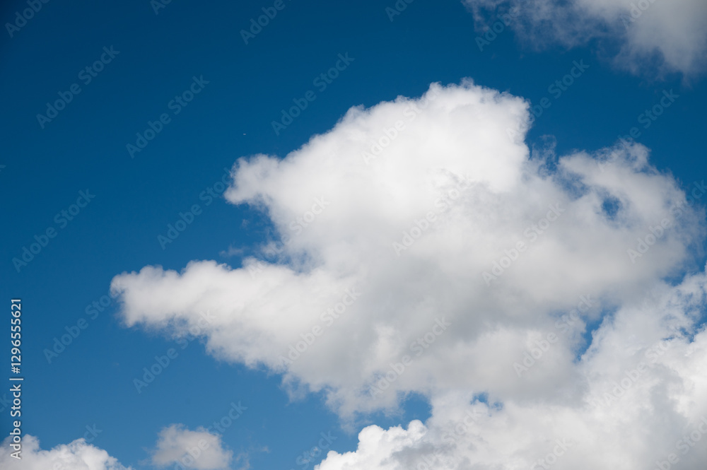 Beautiful blue sky with white fluffy big clouds Beautiful blue sky with white fluffy big clouds