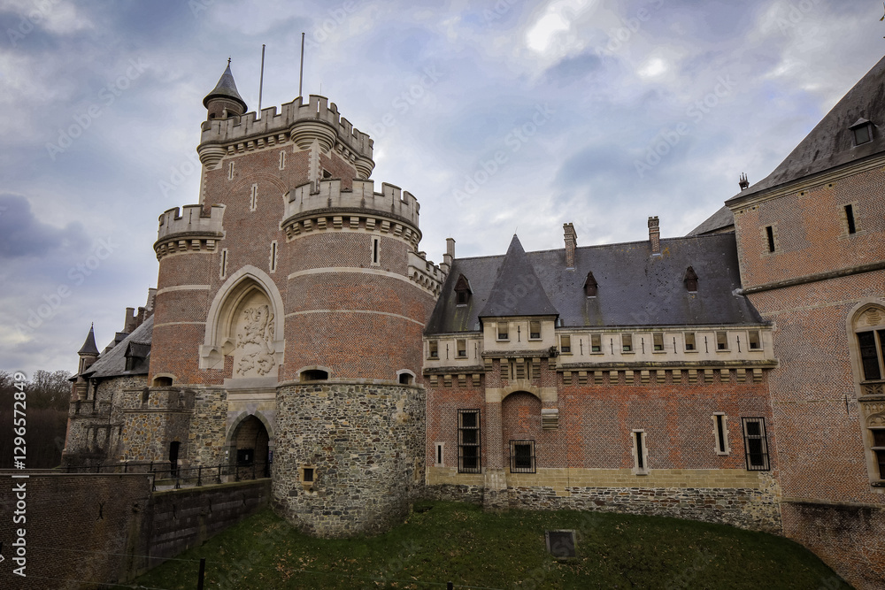 Haasbeck Castle in Belgium showcases impressive architecture with intricate brick patterns and historic significance in a scenic landscape Haasbeck Castle in Belgium showcases impressive architecture with intricate brick patterns and historic significance in a scenic landscape