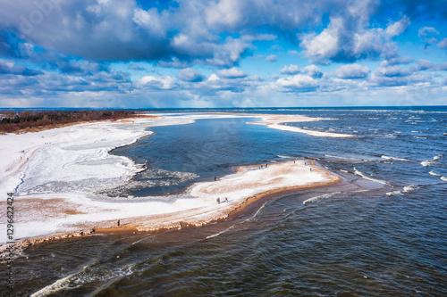 Aerial landscape of Baltic Sea beach in Mikoszewo at snowy winter. Poland photo