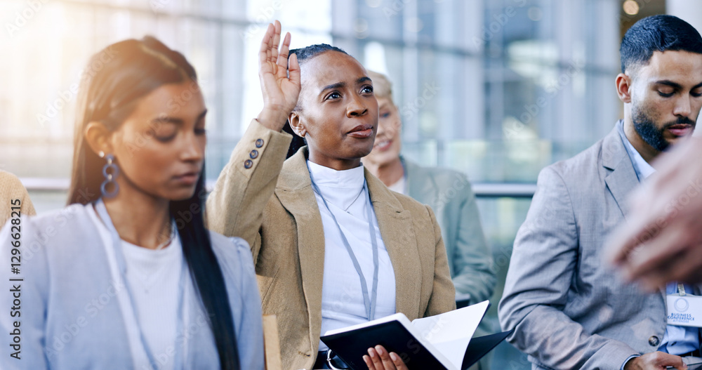 Obraz premium Seminar, woman and question with hand raised for presentation, conference and convention or workshop. Diversity business people, faq and answer in team building, asking and participation in training