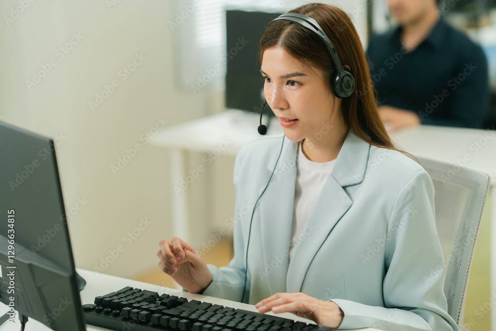 Smiling asian woman working as a customer support operator with headset. Female Call center agent, consulting and telemarketing concept, Customer service representative. online technical consultant. Smiling asian woman working as a customer support operator with headset. Female Call center agent, consulting and telemarketing concept, Customer service representative. online technical consultant.