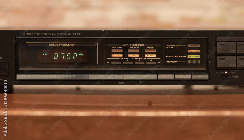 Obraz premium Close-Up View of a Vintage Radio Preset Station Panel