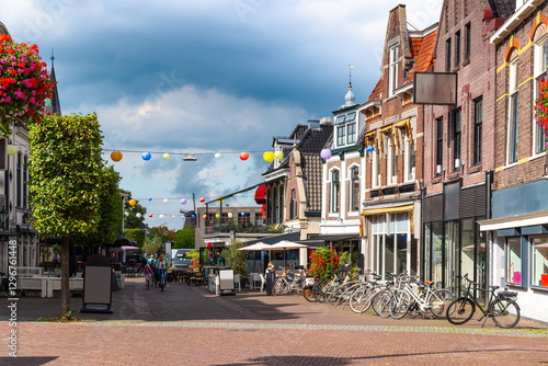 Bild auf Leinwand Bustling streets with cafés, shops, and urban charm in the Dutch town Heerenveen