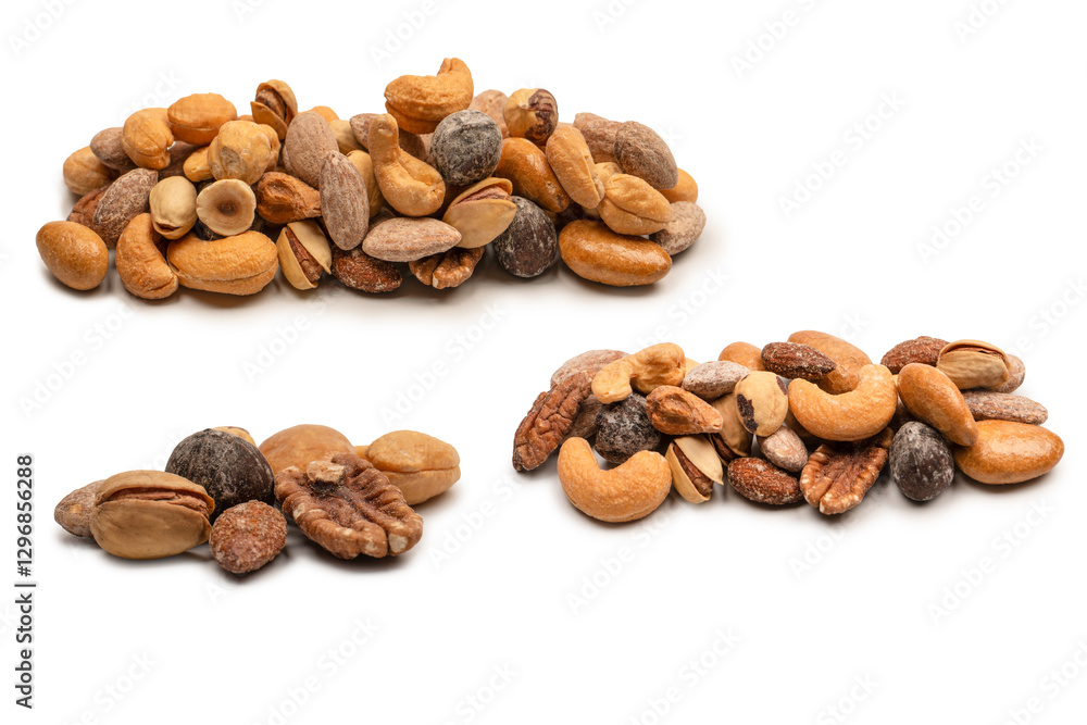 A group of almonds, pistachios, walnuts, macadamia, cashews. A group of almonds, pistachios, walnuts, macadamia, cashews.