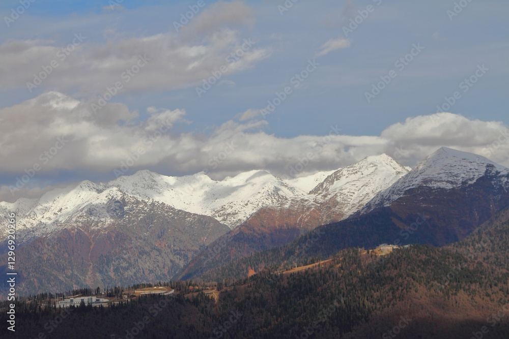Snow-capped peaks of Caucasus in late autumn. Rosa Khutor Resort, Sochi, Russia Snow-capped peaks of Caucasus in late autumn. Rosa Khutor Resort, Sochi, Russia