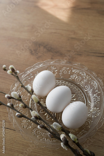 Fresh farm eggs in carton box on wooden table. Eggs in egg boxes