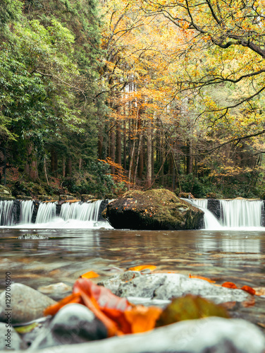 waterfall in autumn forest