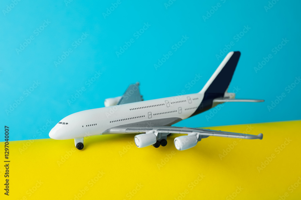 Fototapeta premium One plane model on color background, closeup