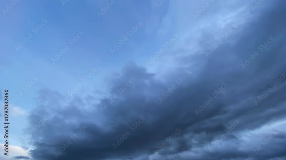 Dark overcast cumulus clouds flowing on sky. Nature, weather, air time lapse background Dark overcast cumulus clouds flowing on sky. Nature, weather, air time lapse background