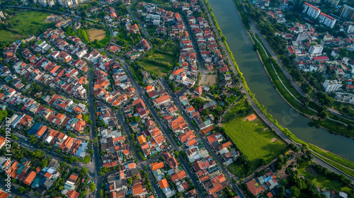 Obraz na płótnie Bird's eye view of the city capturing a sprawling urban landscape with towering skyscrapers bustling streets and vibrant city life. w salonie