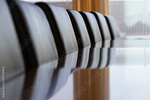 Empty meeting room table with chairs.