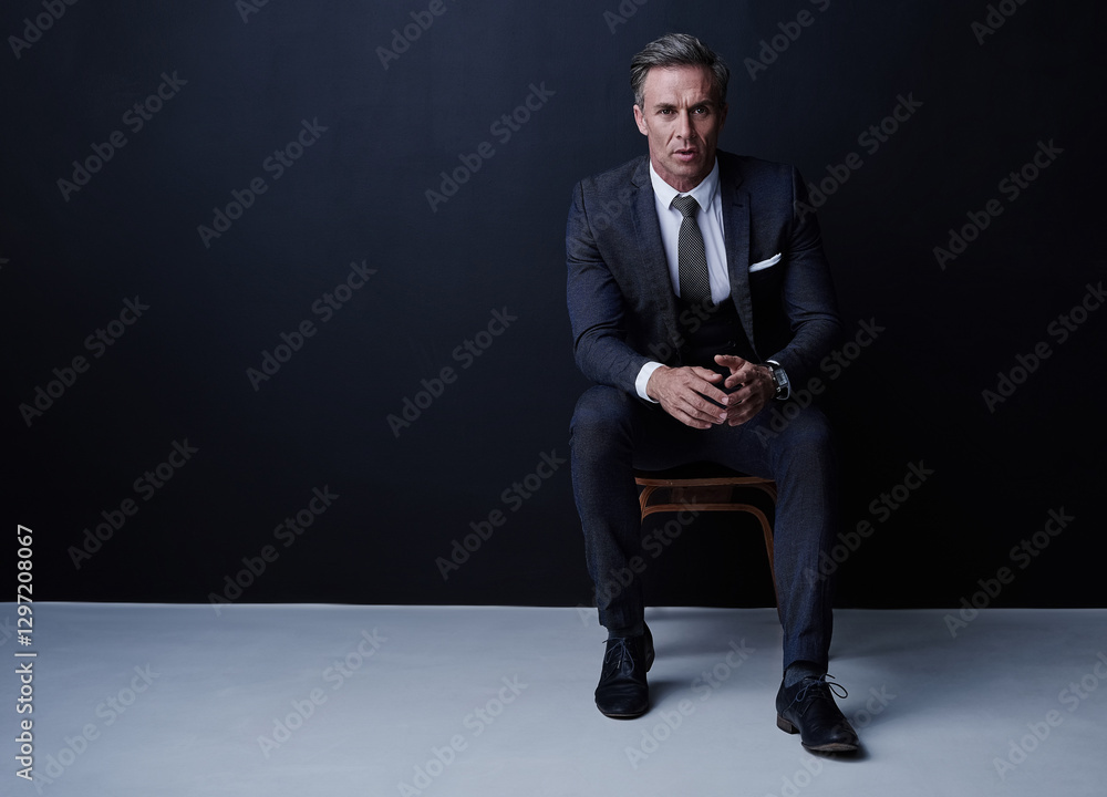 Studio, mature and businessman in portrait for fashion, corporate project or attorney for law firm. Mockup space, male lawyer or arms crossed with legal aid for justice, court case or dark background Studio, mature and businessman in portrait for fashion, corporate project or attorney for law firm. Mockup space, male lawyer or arms crossed with legal aid for justice, court case or dark background
