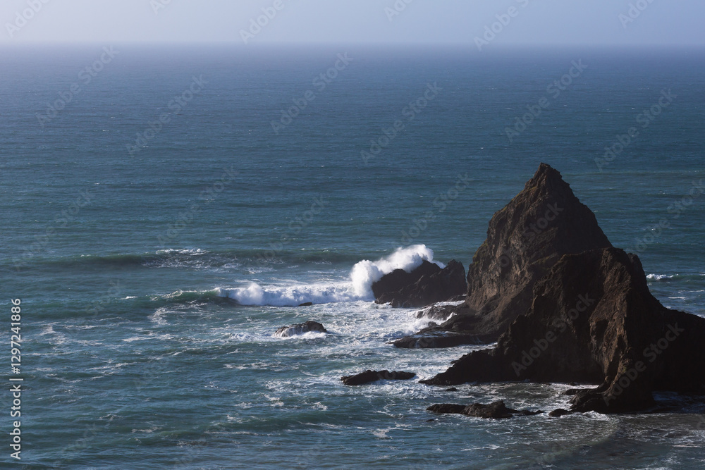 A sharp outcrop on the shore of California. A sharp outcrop on the shore of California.