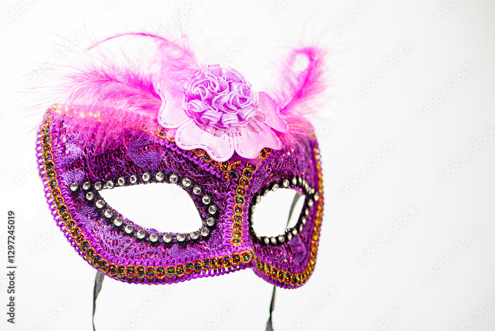 Fototapeta premium Carnival mask, beautiful carnival mask in detail, with white background, selective focus.