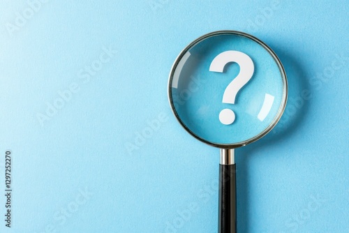 Question mark magnified, seeking answers,  light blue background